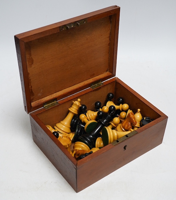 A turned wood and weighted Staunton pattern chess set, king 8cm tall. Condition - good and complete.